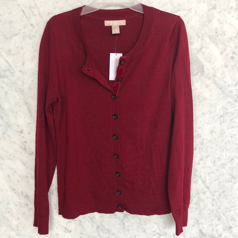 Maroon cardigan with velvet lining along buttons